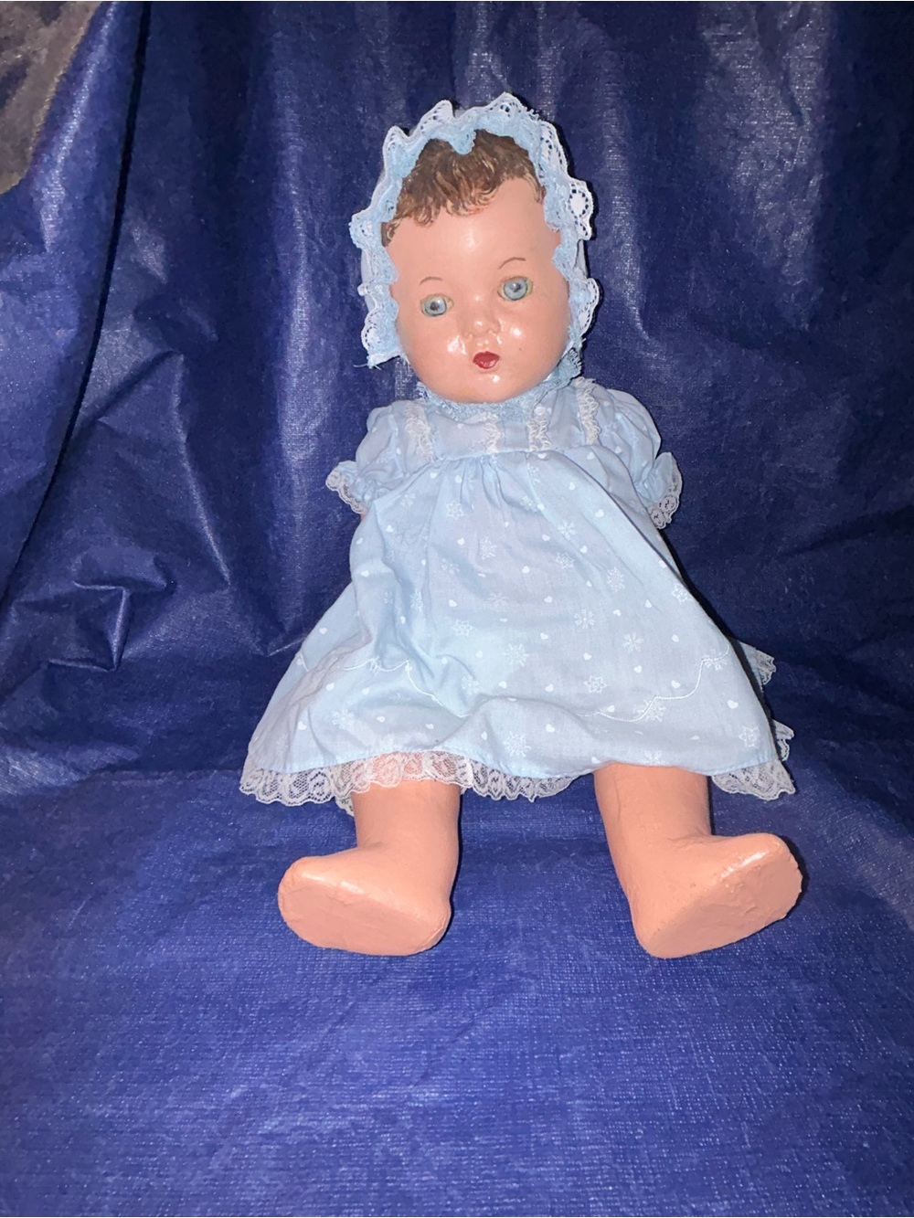 vintage composition baby doll dating from the 1930s to the 1940s